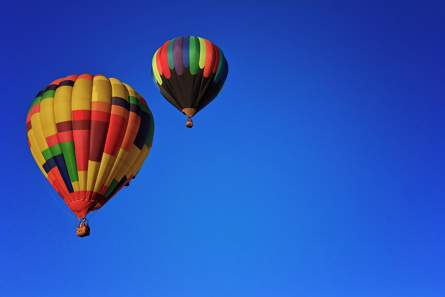 Blue Skies Photograph - Two Hot Air Balloons by Erick Castellon