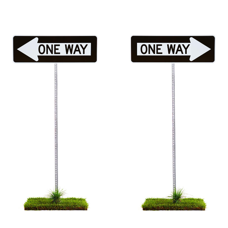 Two one way signs pointing to opposite directions Photograph by Thomas Northcut