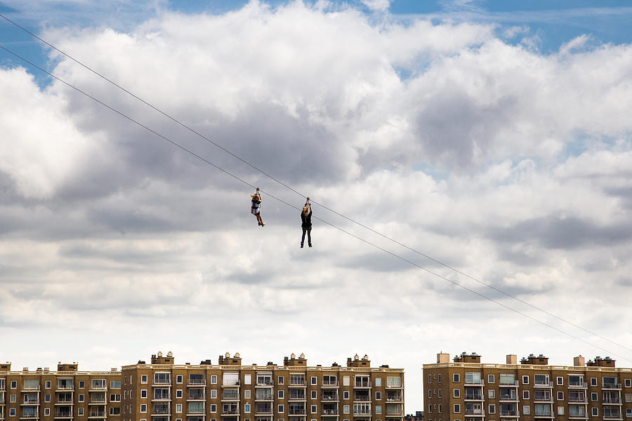 Two Persons On A Zipline Photograph by Helaine Weide
