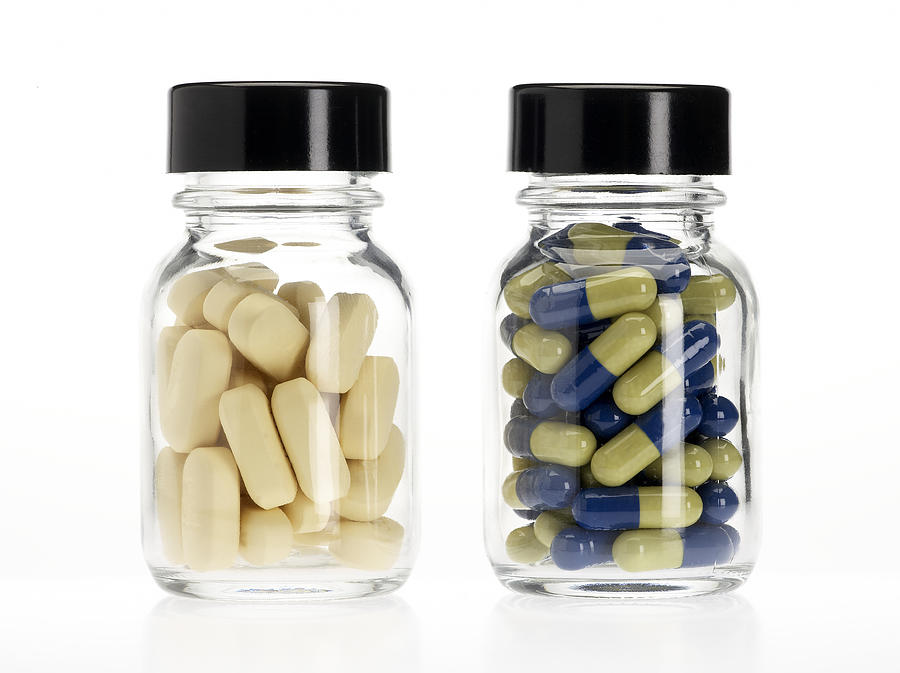 Two pills bottles Photograph by Clu Two pills bottles Photograph by Clu