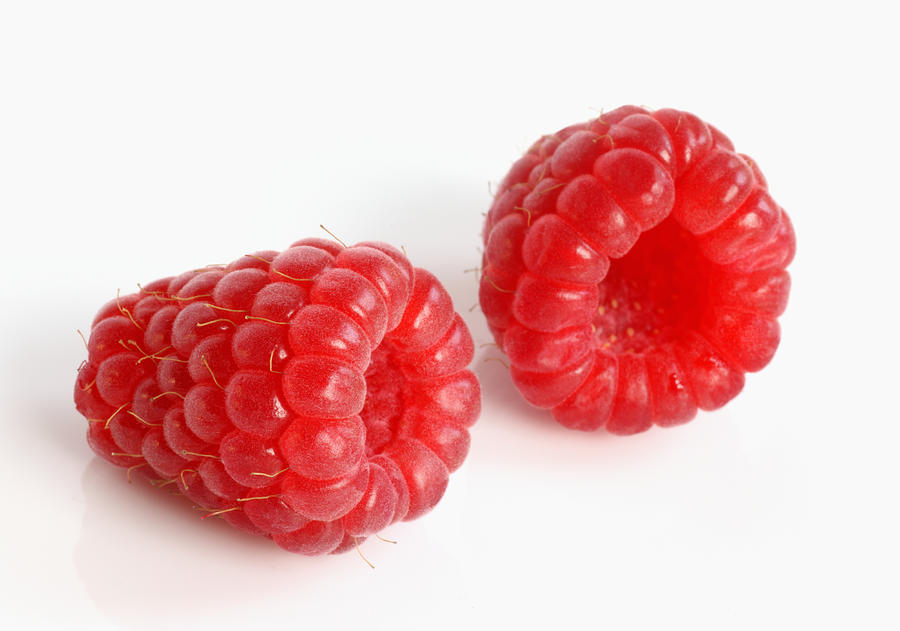 Two red, ripe raspberries Photograph by Rosemary Calvert