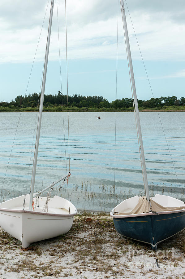 Two sailboats sit ready for rent at the lake at Sugden Regional  Photograph by William Kuta
