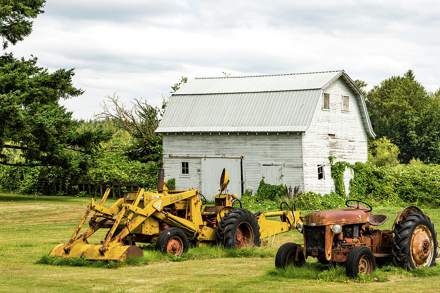 Two Tractors in a Field Photograph by Tom Cochran