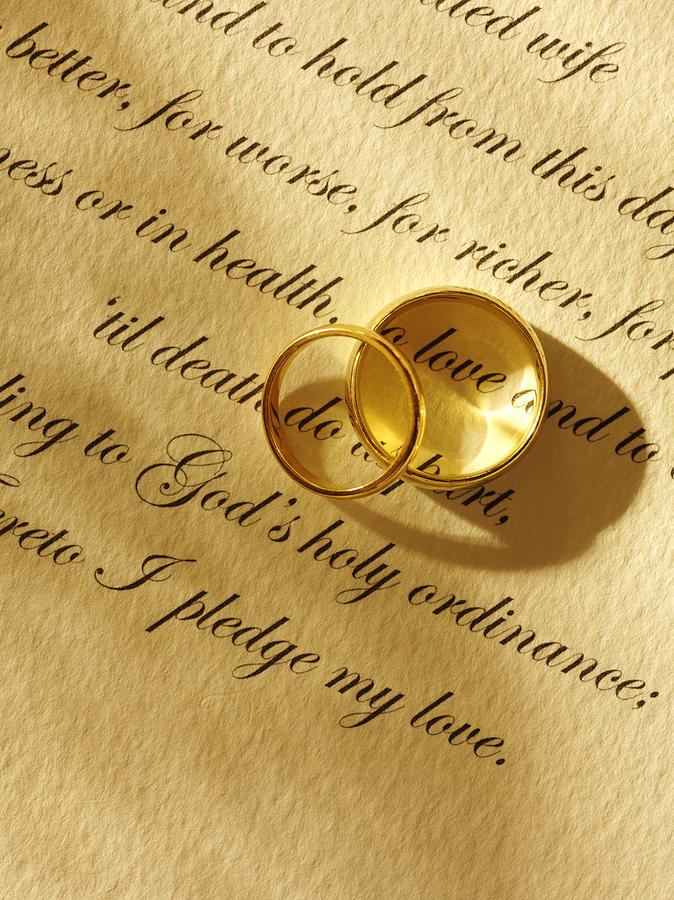 Two Wedding Rings and Traditional Marriage Vows Photograph by Wragg