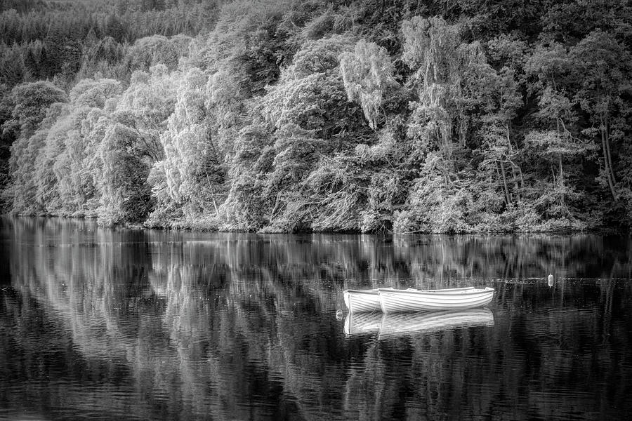 Two White Rowboats on the Lake at Pitlochry in Black and White Photograph by Debra and Dave Vanderlaan