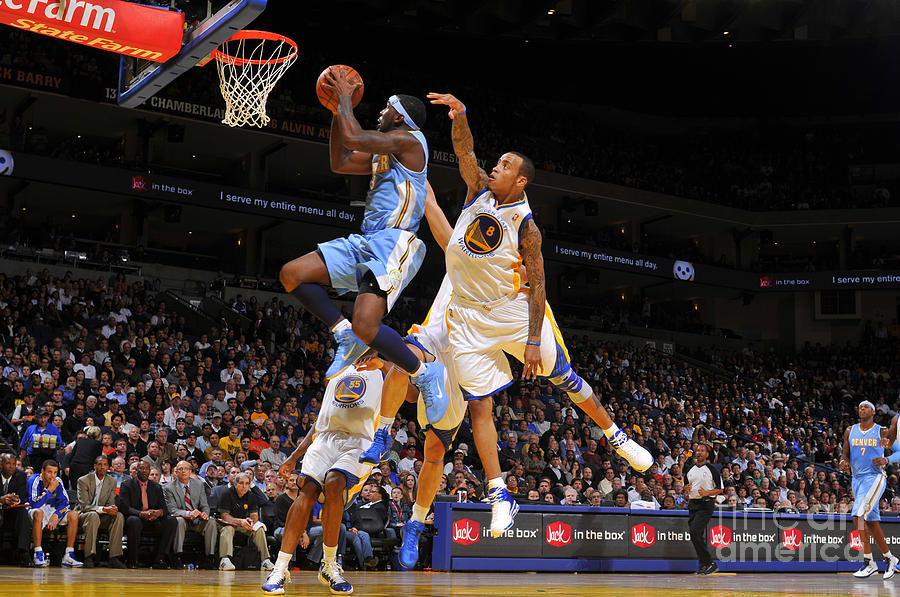 Ty Lawson and Monta Ellis Photograph by Rocky Widner