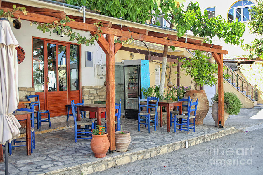 Typical Greek taverna in Crete Photograph by Patricia Hofmeester
