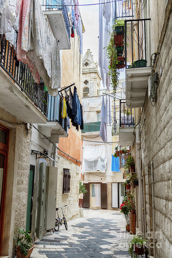 typical street  in the old center of Bari, region Puglia, Italy Photograph by Ariadna De Raadt
