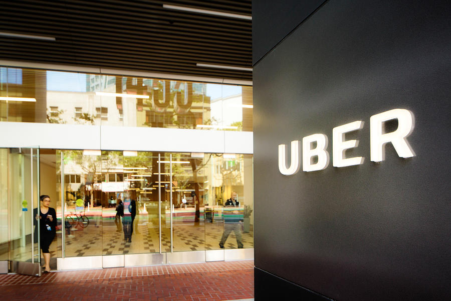 Uber headquarters entrance in San Francisco with sign Photograph by NicolasMcComber