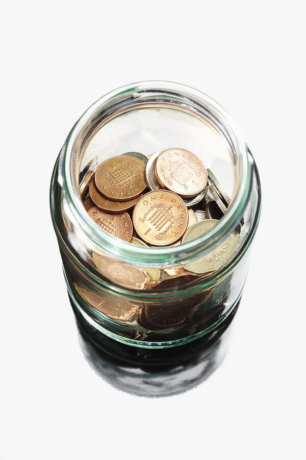 UK coins in jar Photograph by Richard Drury