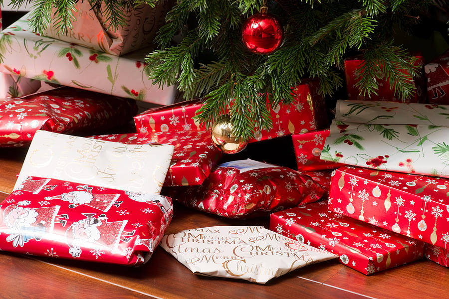 UK, Great Britain, England, London, View Of Wrapped Presents Underneath Christmas Tree Photograph by Kypros