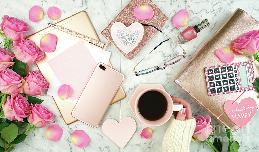 Ultra feminine pink desk workspace with rose gold accessories flatlay. Photograph by Milleflore Images