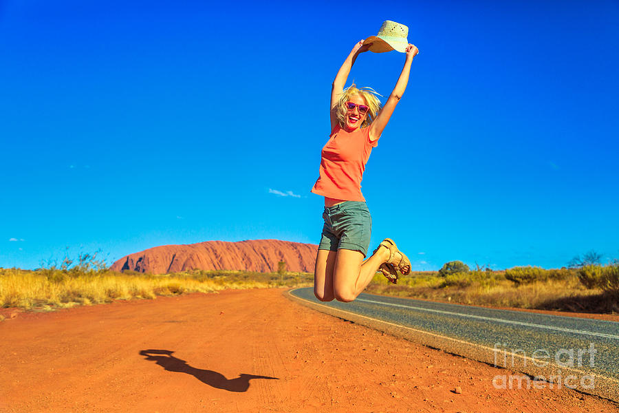 Uluru woman enjoying Photograph by Benny Marty