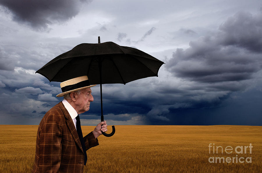Umbrella Man On The Move Photograph by Bob Christopher