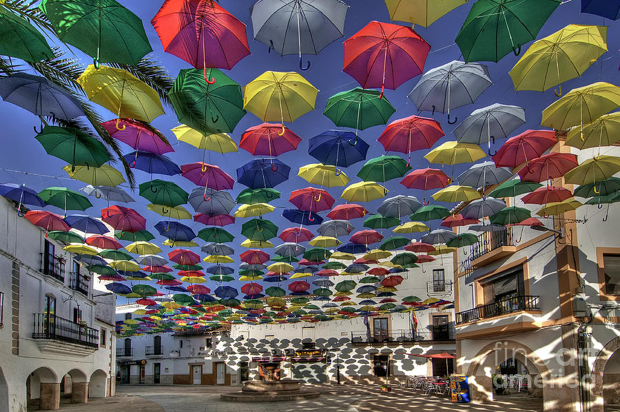 Umbrellas Rainbow - Malpartida de Caceres - Spain Photograph by Paolo Signorini