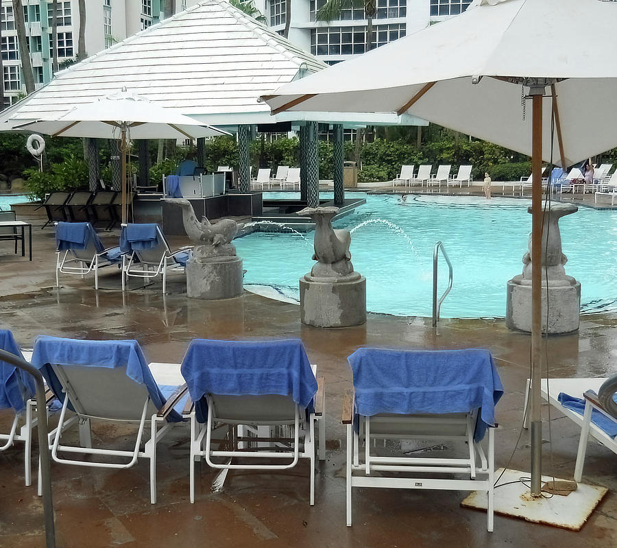 Umbrellas By The Pool Photograph