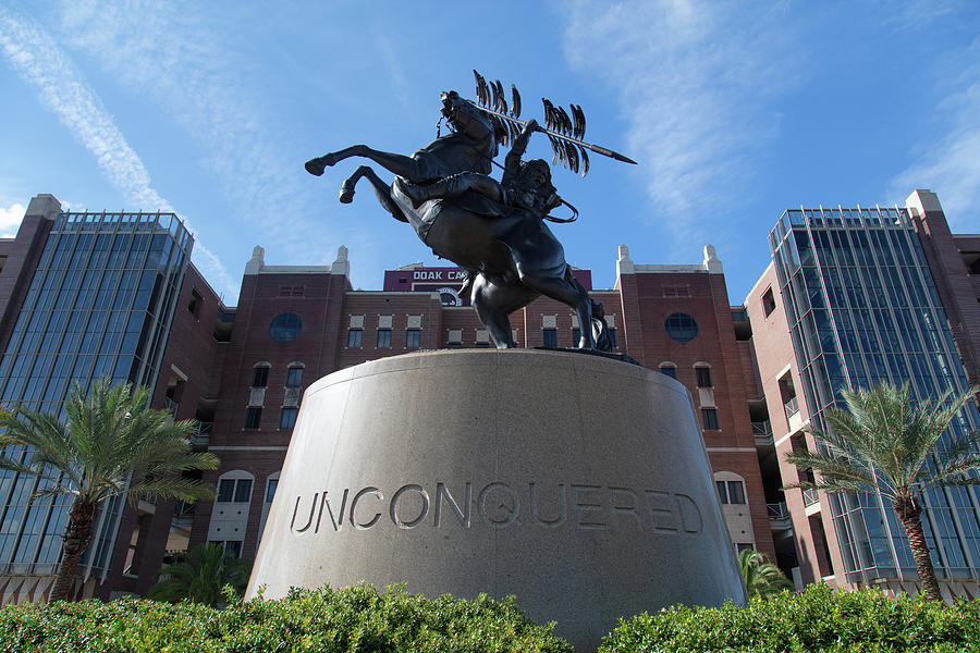 Unconquered statue in front of Doak Campbell Stadium at Florida Statue University Photograph by Eldon McGraw