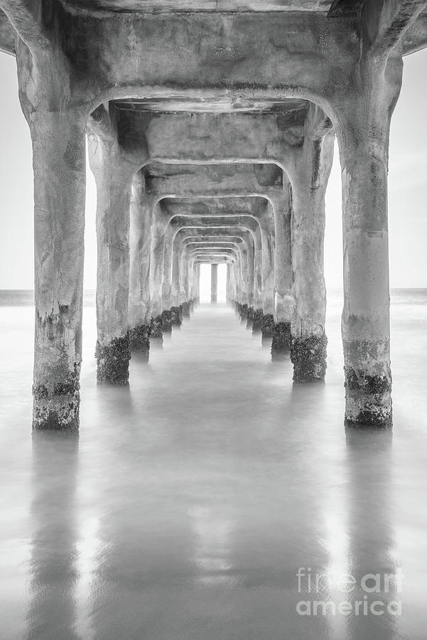 Under Manhattan Beach Pier Black and White Photo Photograph by Paul Velgos
