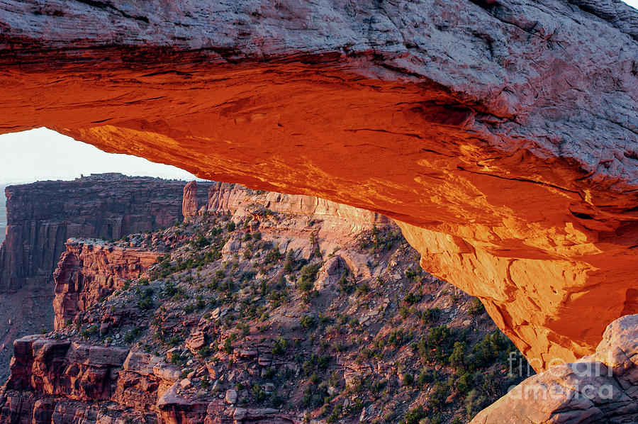 Under Mesa Arch at Sunrise One Photograph by Bob Phillips