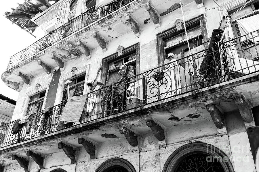 Under the Balcony in Casco Viejo Photograph by John Rizzuto