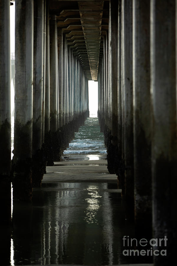 Under the Huntington Beach Pier Photograph by James Moore