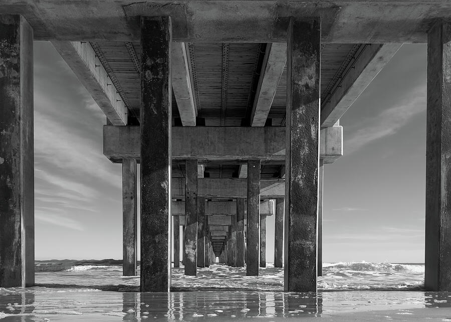 Black And White Photograph - Under the Pier at Folly Beach South Carolina by Good Focused