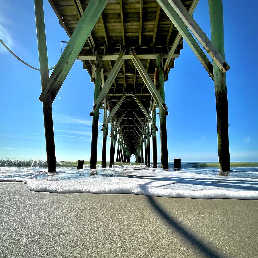 Under the Pier at Holden Beach, NC Photograph by Bill Swartwout