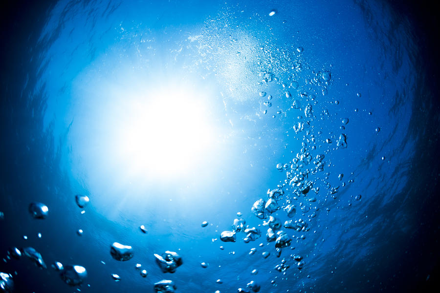 Underwater Bubbles Beautiful Turn Blue Background with Sunlight Photograph by Mutlu Kurtbas