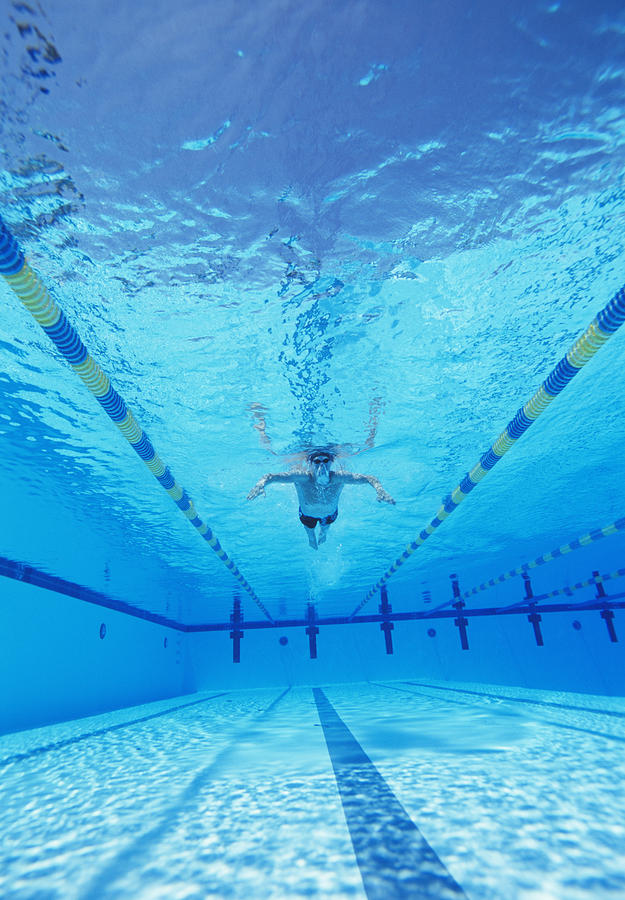 Underwater shot of male athlete swimming in pool Photograph by Moodboard