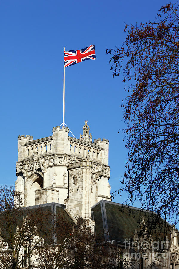 Union Jack flying above the Middlesex Guildhall London UK  Photograph by James Brunker