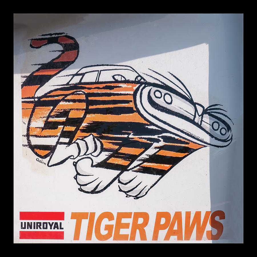 Man Cave Sign Photograph - Uniroyal Tiger Paws Tires sign  by Flees Photos