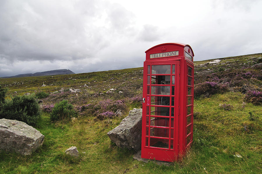United Kingdom, Scotland, Red telephone box in the Highlands Photograph by Westend61