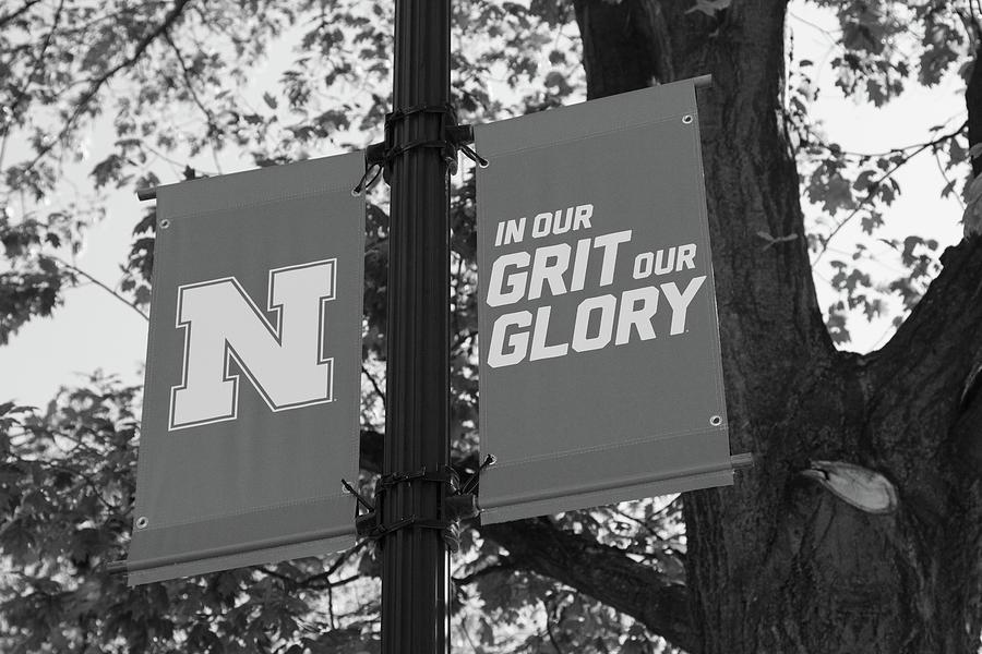University of Nebraska banner In Our Grit Our Glory in black and white Photograph by Eldon McGraw