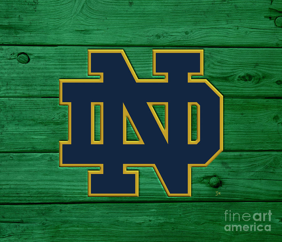 University of Notre Dame Fighting Irish Logo On Green Rustic Boards