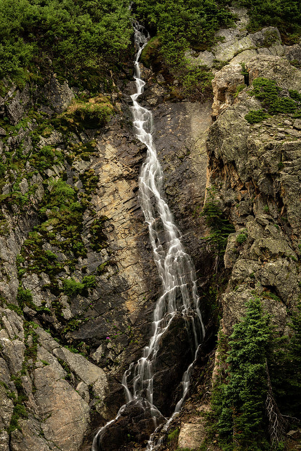 Unknown Water Fall Cascades Down Rocky Cliff Photograph by Kelly VanDellen