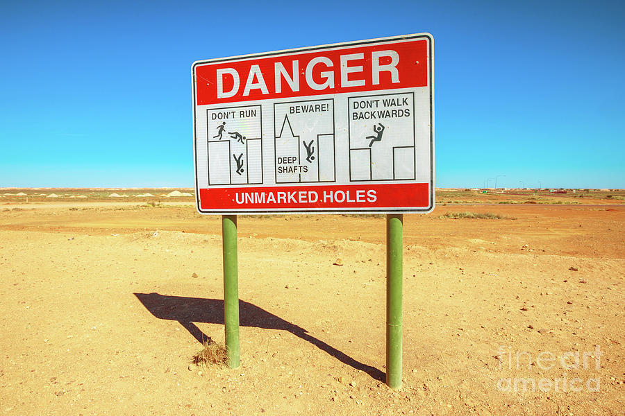 Unmarked holes road sign Photograph by Benny Marty