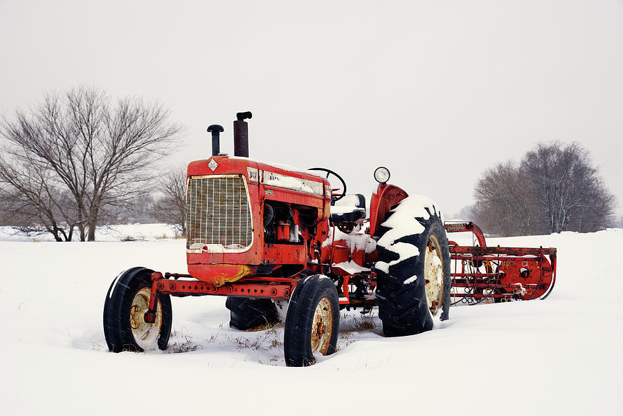 Until the Next Hay -  Allis Chalmers D17 with hayrake in wintry WI field Photograph by Peter Herman