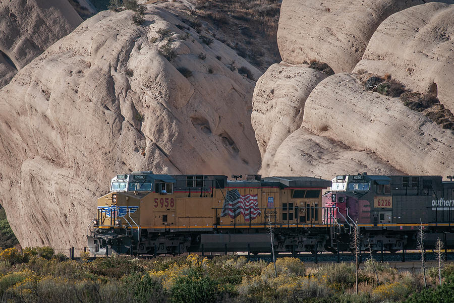 UP 5958 and 6266 west bound in Cajon Pass California Photograph by Jim Pearson