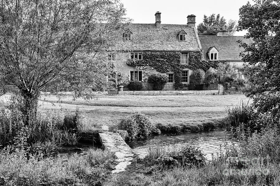 Upper Slaughter Farmhouse and the River Eye Monochrome Photograph by Tim Gainey