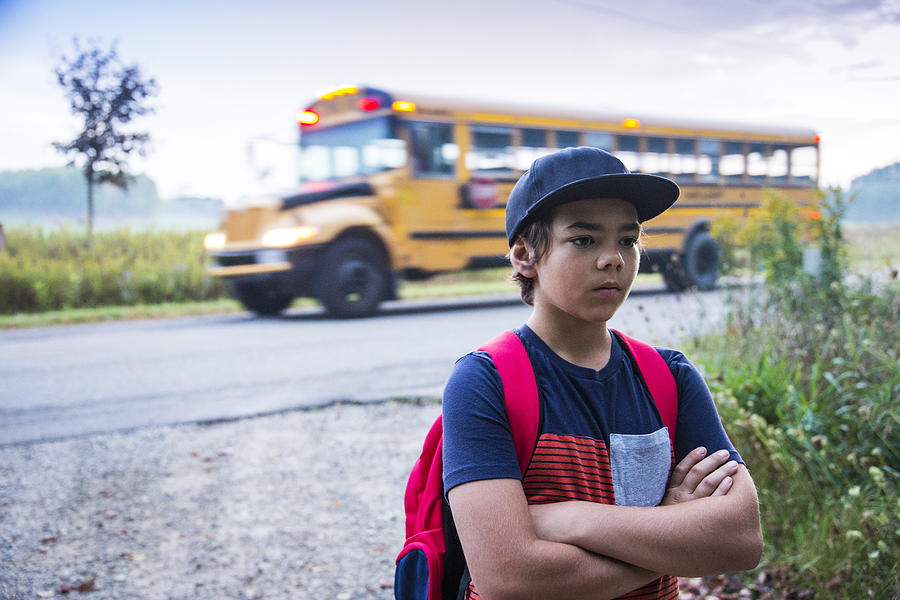 Upset preteen boy not wanting to go to school Photograph by Fertnig