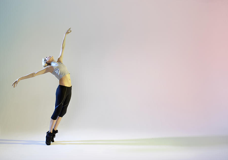 Urban Ballet Dancer In Graceful Pose Photograph by Tara Moore