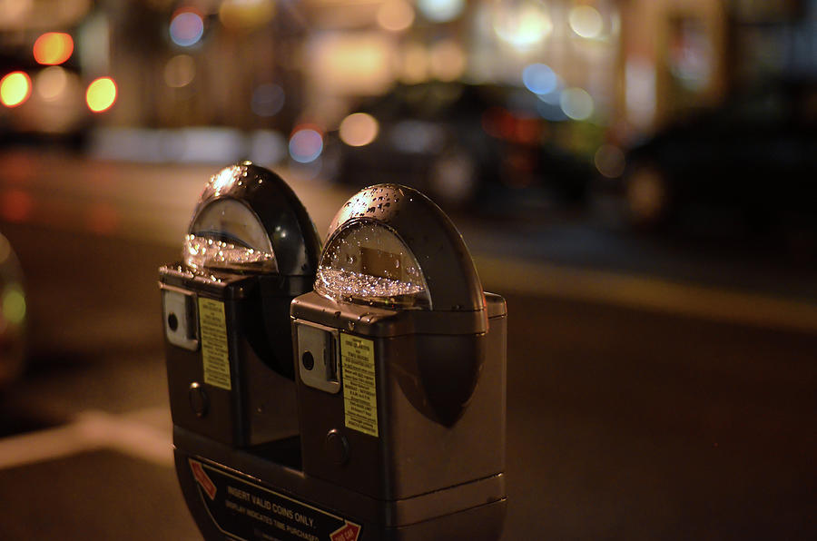 Urban Legend Parking Meter Photograph by Laura Fasulo