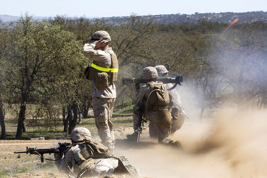 U.S. Marines employ an AT-4 light anti-armor weapon during live-fire training. Photograph by Stocktrek Images