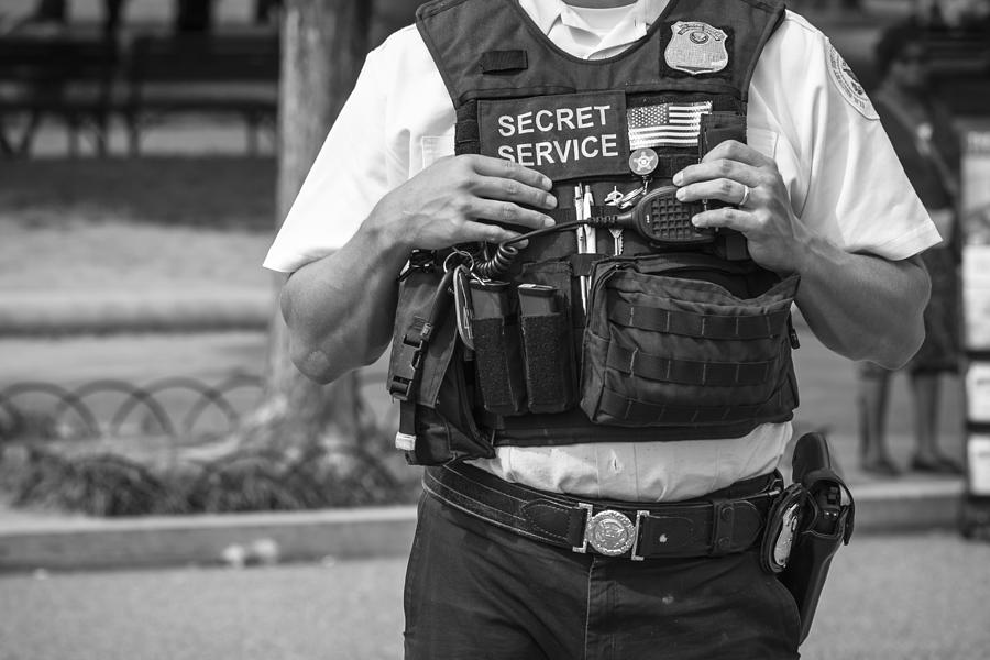 U.S. Secret Service officer outside White House Photograph by Joel Carillet