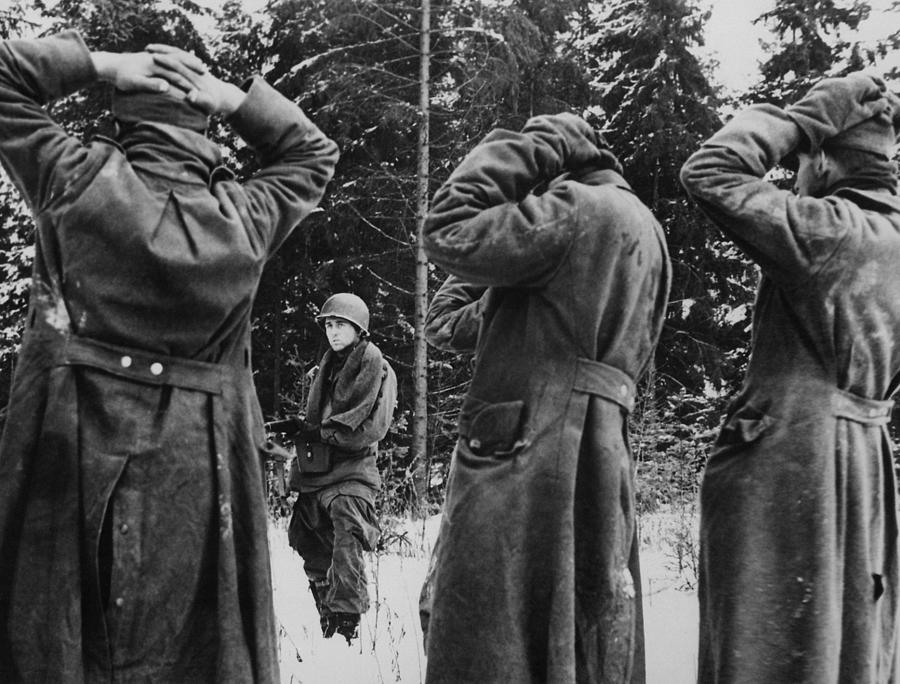 US Soldier Guarding German Prisoners - Battle Of The Bulge - 1944 Photograph by War Is Hell Store