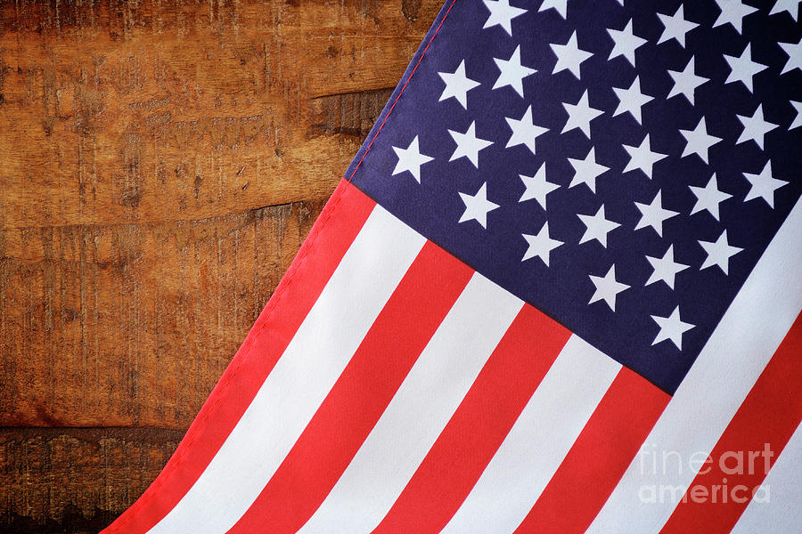 USA American Stars and Stripes flag on wood background Photograph by Milleflore Images