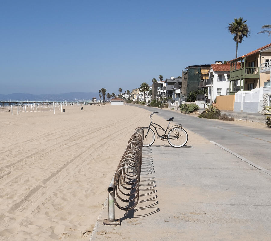 USA, California, Los Angeles, Manhattan Beach, Beach walkway with bike rack Photograph by Tetra Images USA, California, Los Angeles, Manhattan Beach, Beach walkway with bike rack Photograph by Tetra Images