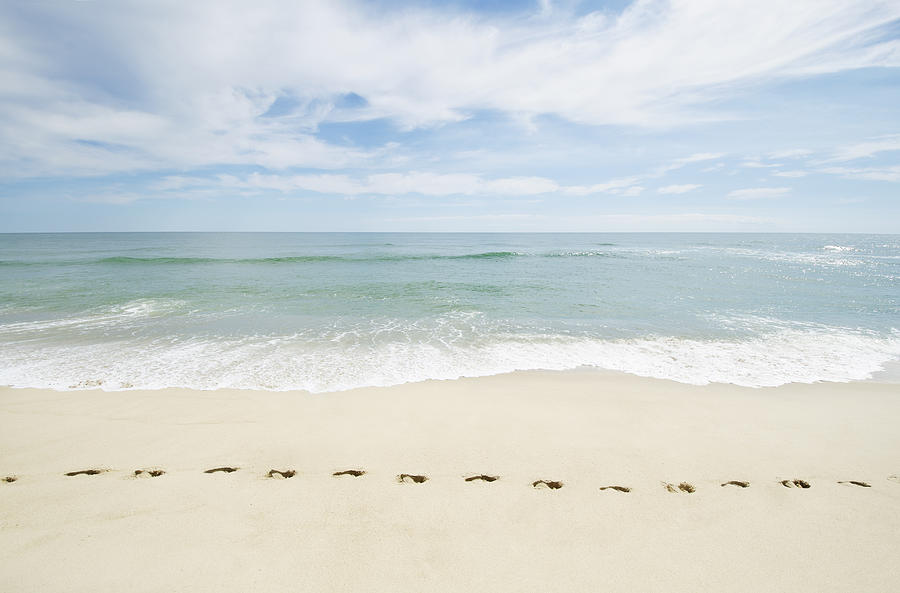 USA, Massachusetts, Footprints on empty beach Photograph by Chris  Hackett