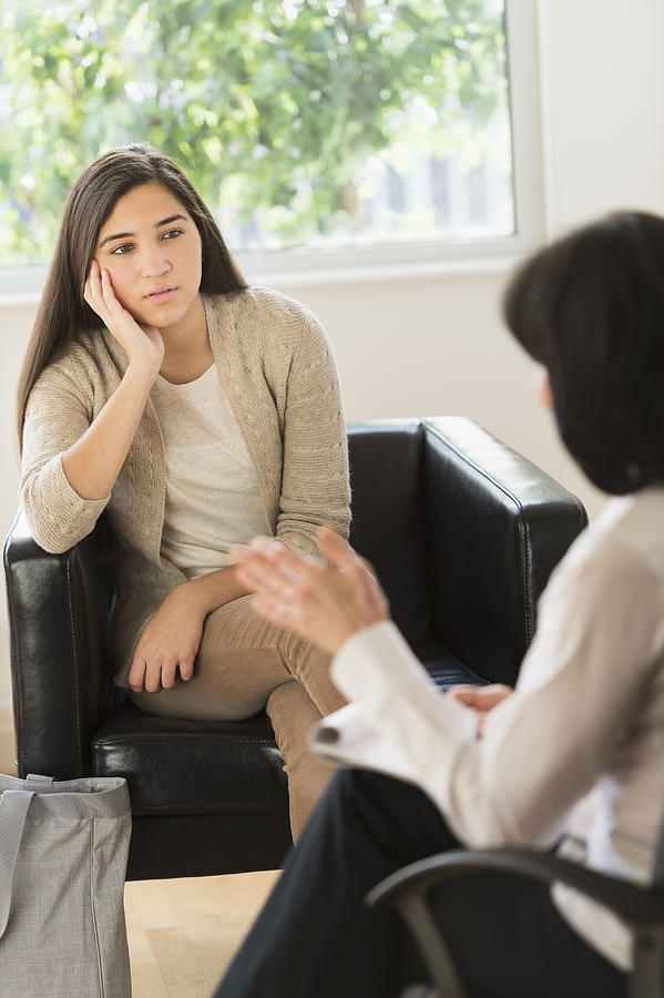USA, New Jersey, Jersey City, Teenage girl (16-17) talking to therapist Photograph by Tetra Images