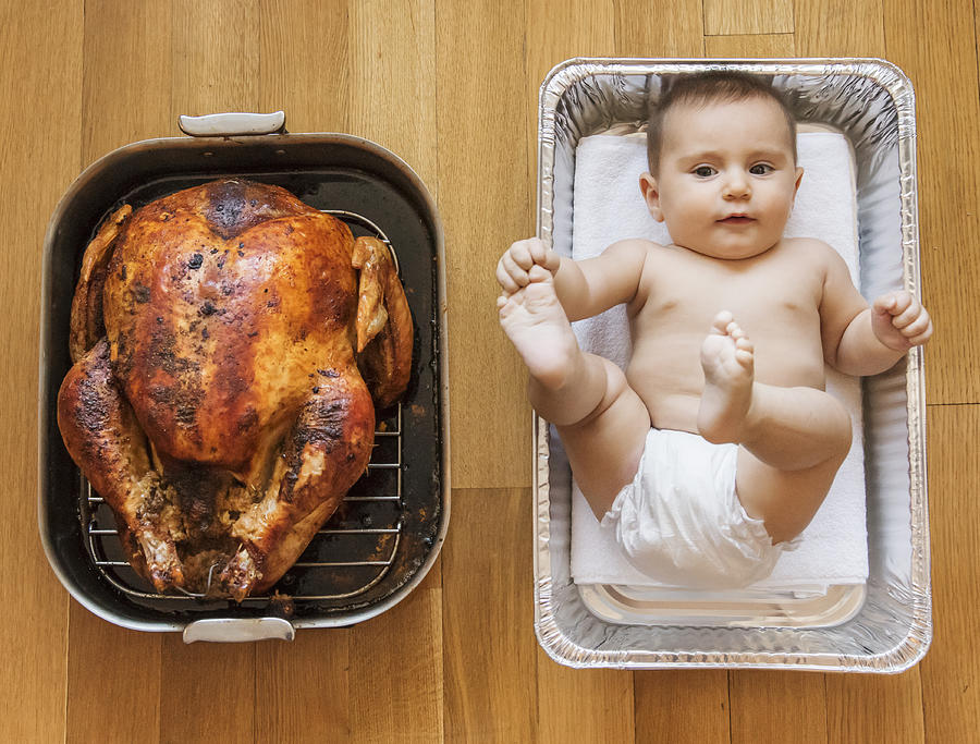 USA, New York State, New York City, Baked turkey and baby girl (2-5 months) in baking dish Photograph by Tetra Images